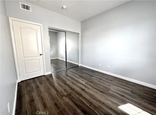 a view of a swimming pool with a yard