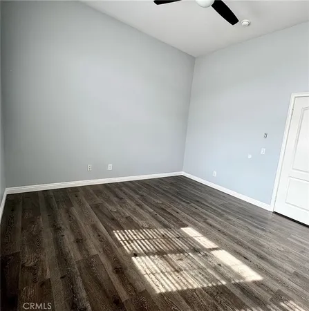 a view of a park with swings and slides