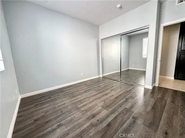 a view of a swimming pool with a yard