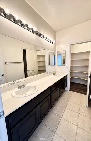 a view of a swimming pool with an outdoor space and seating area