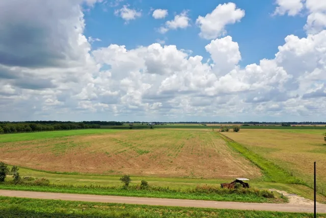 a view of a lake with a big yard