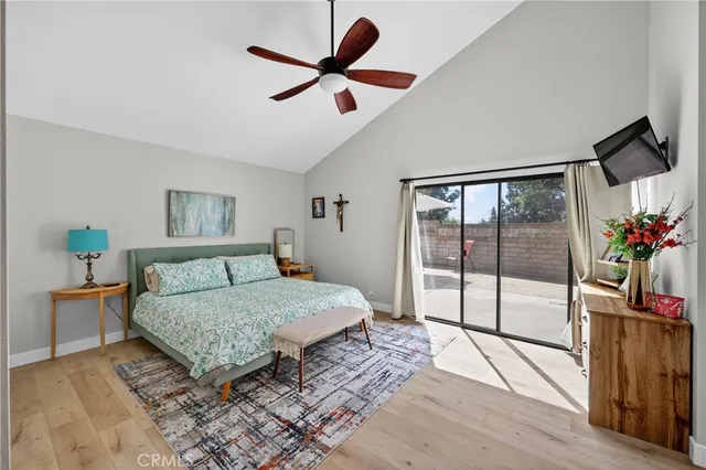 a bedroom with a bed and a dresser in it