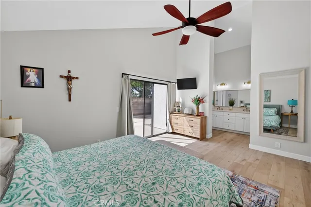 a bathroom with a double vanity sink mirror and shower