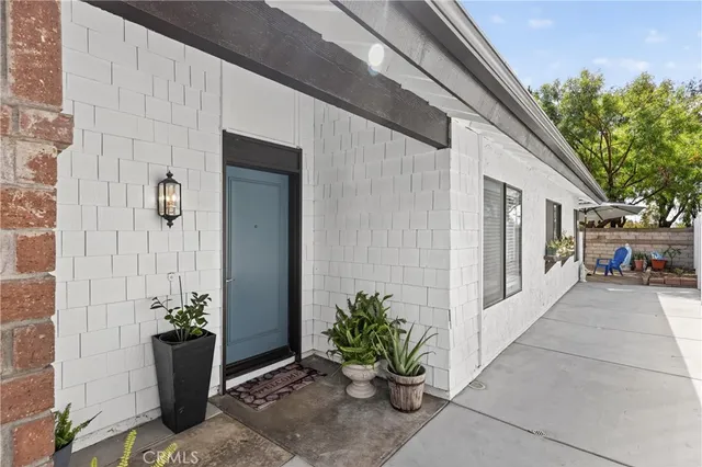a front view of a house with patio