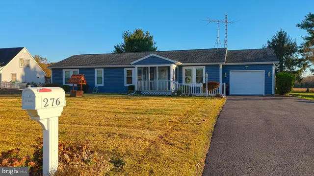 a view of a house with a swimming pool