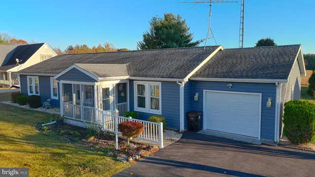 a aerial view of a house with a garden