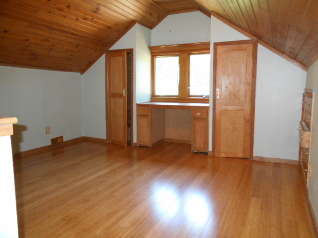 319 East Devlin Street Spring Valley, IL 61362 - Photo 11 of 19 a view of empty room with wooden floor and fan