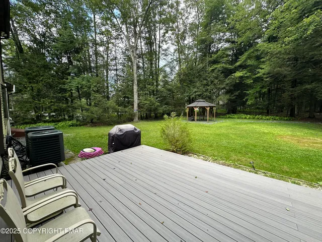 a view of a backyard with a garden