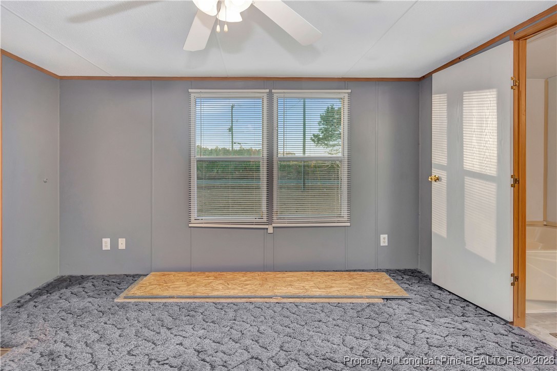 6461 Wire Grass Road Orrum, NC 28369 - Photo 11 of 22 a view of a room with window