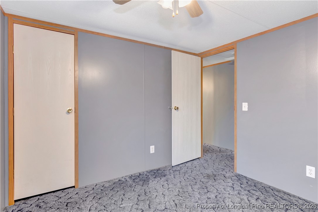 6461 Wire Grass Road Orrum, NC 28369 - Photo 15 of 22 a view of an empty room