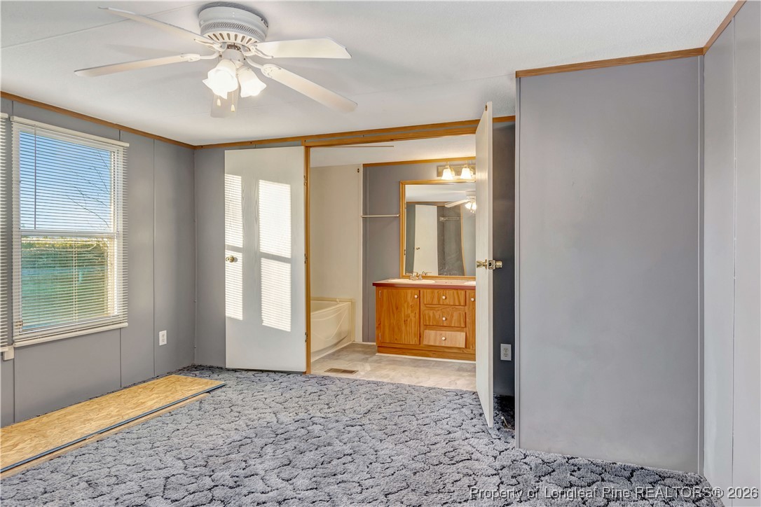 6461 Wire Grass Road Orrum, NC 28369 - Photo 9 of 22 a view of livingroom with a front door