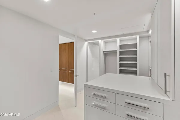 a bathroom with a shower and a toilet