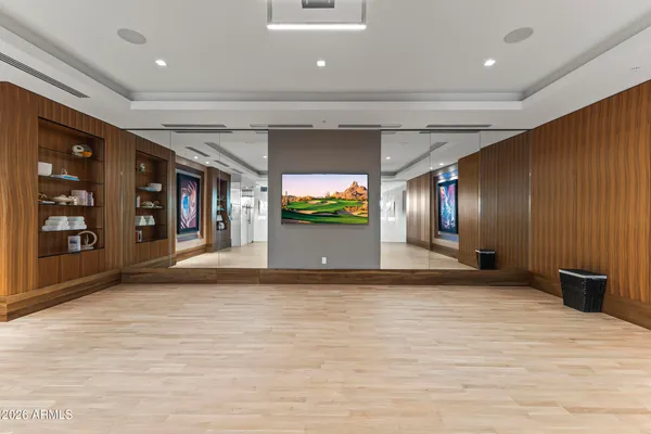 a view of swimming pool with outdoor seating and city view