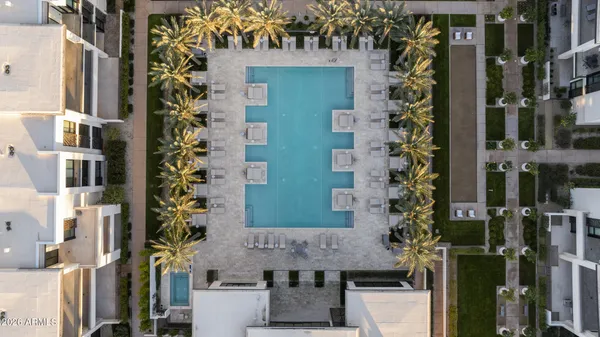 front view of a house with a plants and trees