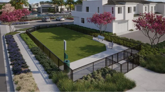 a view of a backyard with sitting area