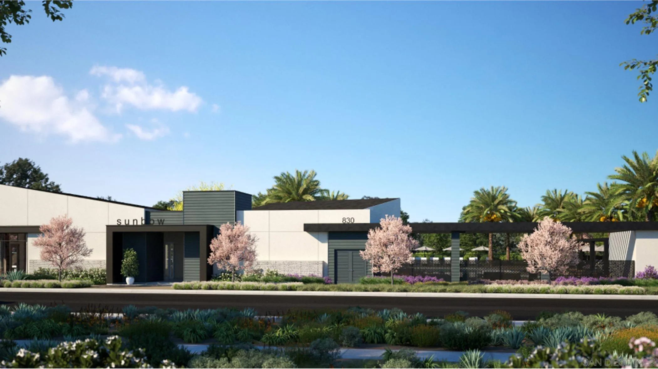 857 Cheyne Loop, Unit 3 Chula Vista, CA 91911 - Photo 15 of 16 a front view of a house with a yard and potted plants