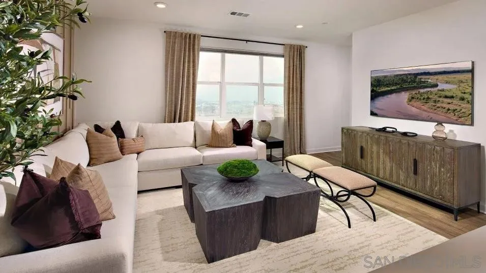 857 Cheyne Loop, Unit 3 Chula Vista, CA 91911 - Photo 4 of 16 a living room with furniture and a flat screen tv