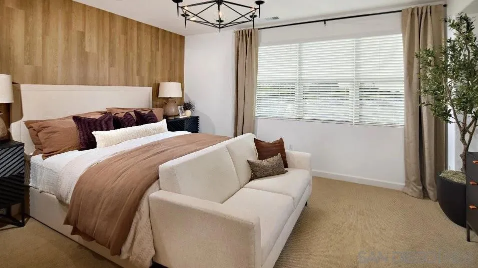 857 Cheyne Loop, Unit 3 Chula Vista, CA 91911 - Photo 7 of 16 a bedroom with a bed and a window