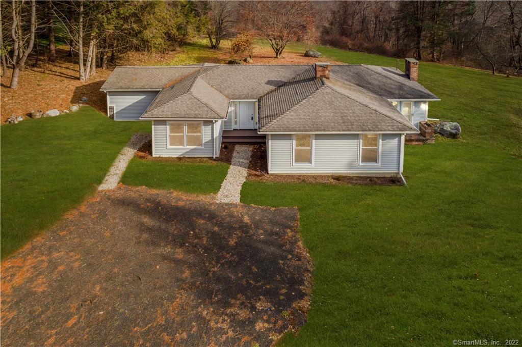 128 Todd Hill Road Bethlehem, CT 06751 - Photo 1 of 1 front view of house with a yard