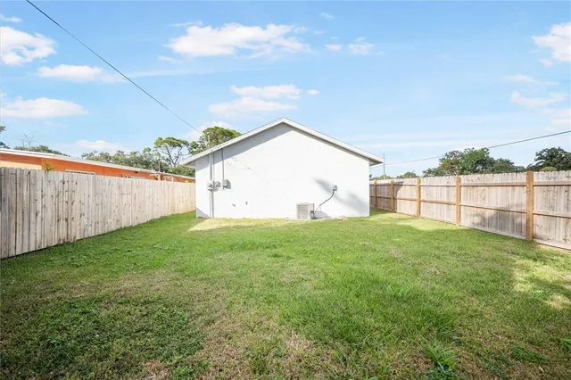 a view of a backyard with a garden
