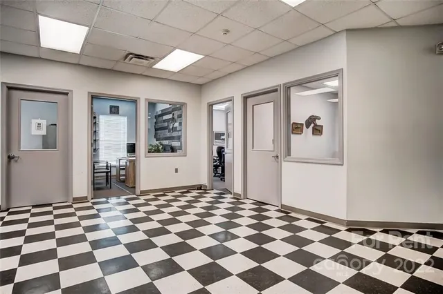 a view of a big room with a black and white checkered floor