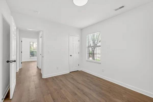 a bathroom with a sink a vanity and bathtub