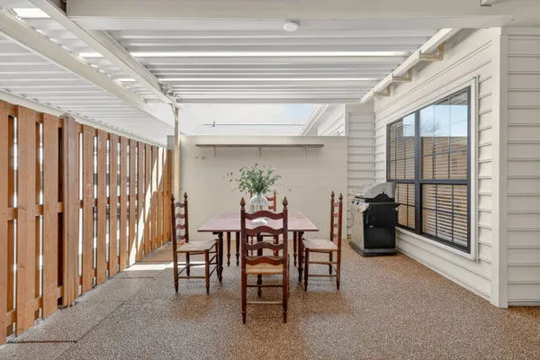 a view of a car parked in front of a house