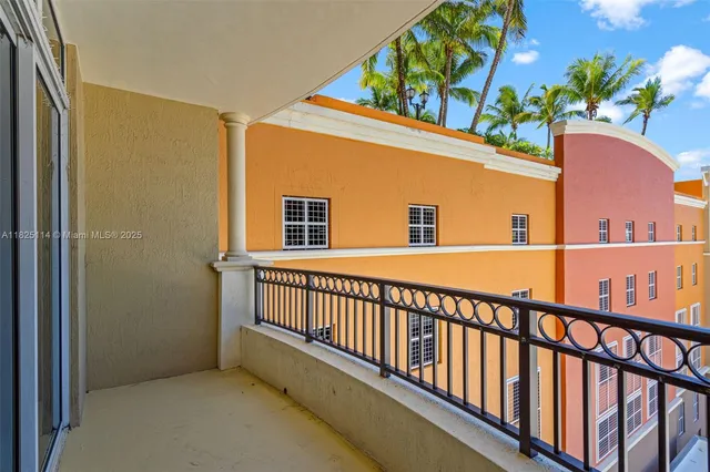 a view of balcony with potted plants