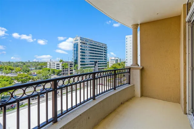 a view of balcony with furniture