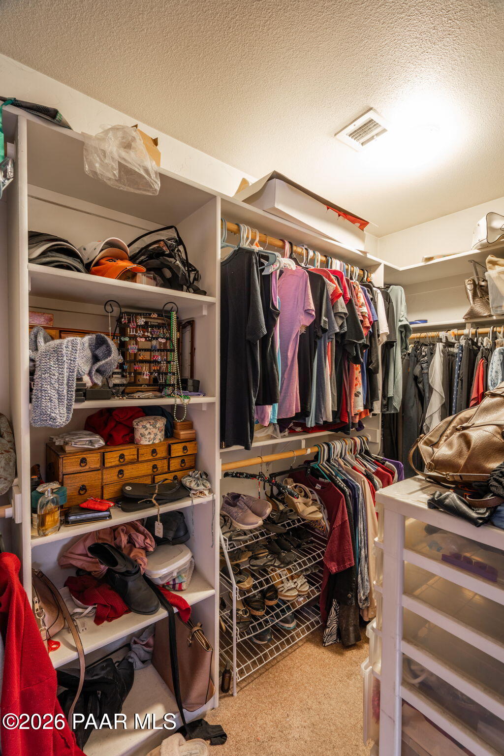 1710 Grandview Road Prescott, AZ 86305 - Photo 16 of 47 a view of walk in closet with clothes