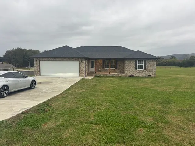 a house view with a garden space