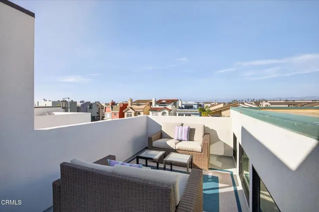 a view of roof deck with seating space