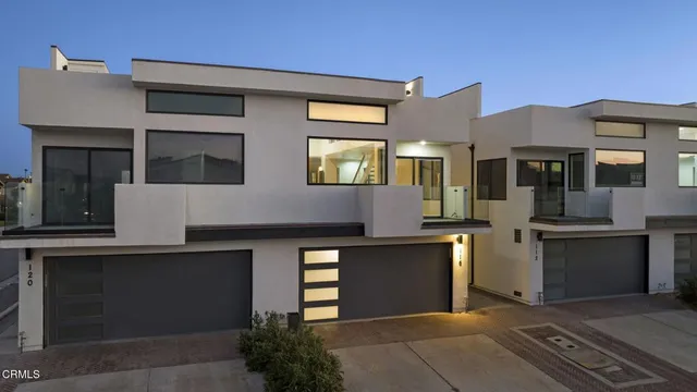 a front view of a house with yard
