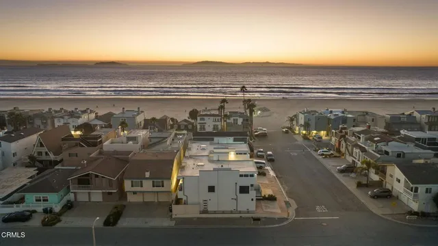 a view of an empty room with wooden walls
