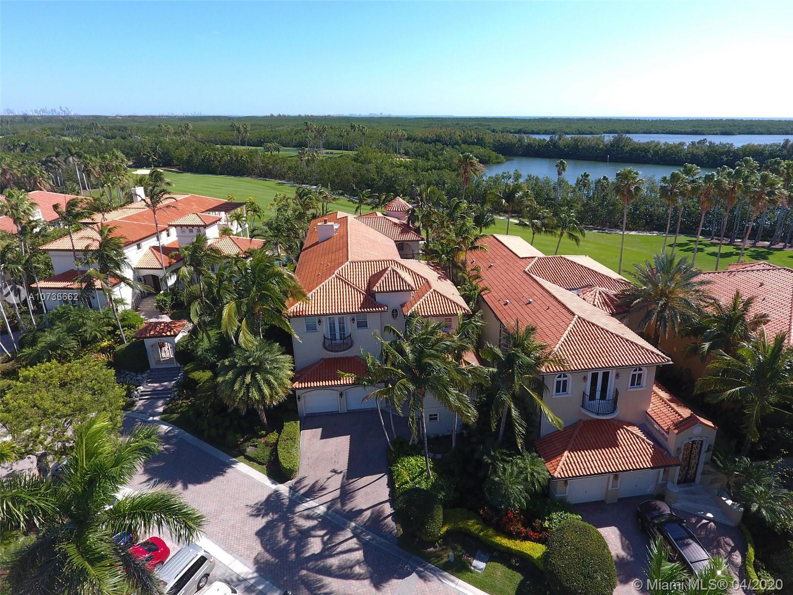 Stunning Deering Bay Estate Home located on the 4th hole of exclusive and private Arnold Palmer Golf Course.