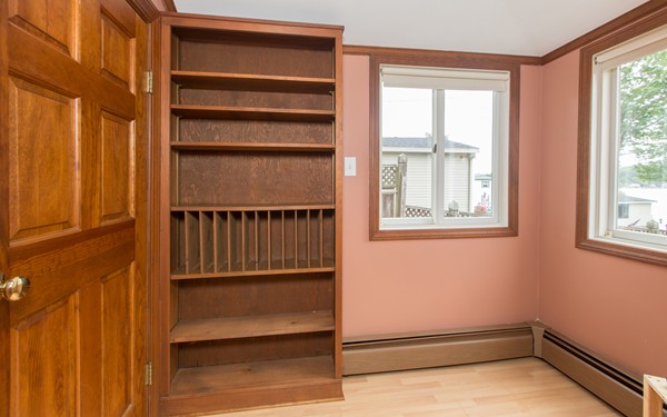 89 Lake Attitash Road Amesbury, MA 01913 - Photo 13 of 29 a view of walk in closet with empty racks