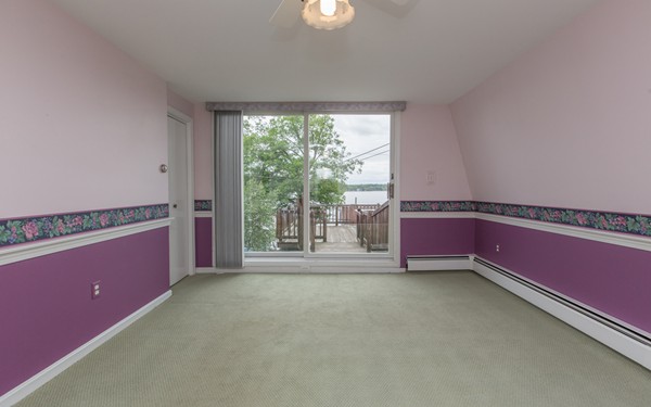 89 Lake Attitash Road Amesbury, MA 01913 - Photo 19 of 29 a room with window