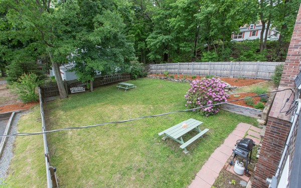 89 Lake Attitash Road Amesbury, MA 01913 - Photo 23 of 29 a view of a backyard