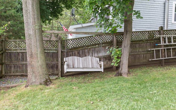 89 Lake Attitash Road Amesbury, MA 01913 - Photo 25 of 29 a view of a deck with a yard