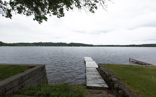 89 Lake Attitash Road Amesbury, MA 01913 - Photo 3 of 29 a view of a lake with outdoor space