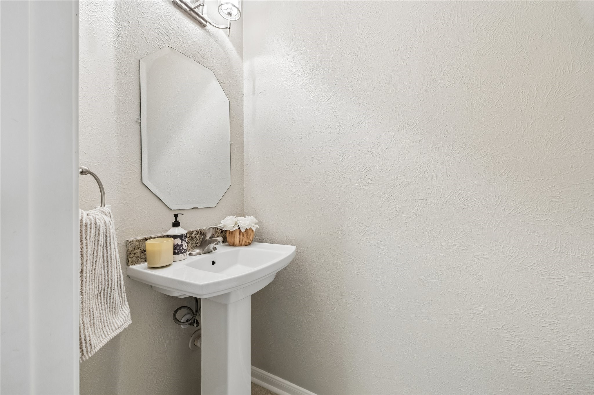 5811 Walkabout Way Katy, TX 77450 - Photo 15 of 33 Convenient first-floor powder bath thoughtfully positioned in the front foyer for guests.