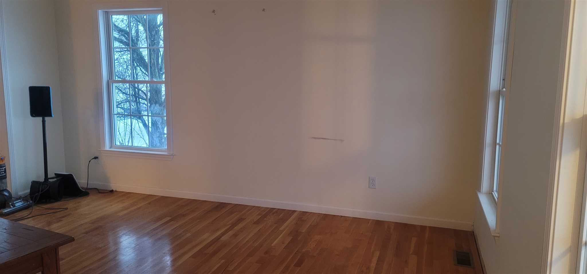39 Brookside Lane Lagrangeville, NY 12540 - Photo 18 of 30 a view of an empty room with wooden floor and a window