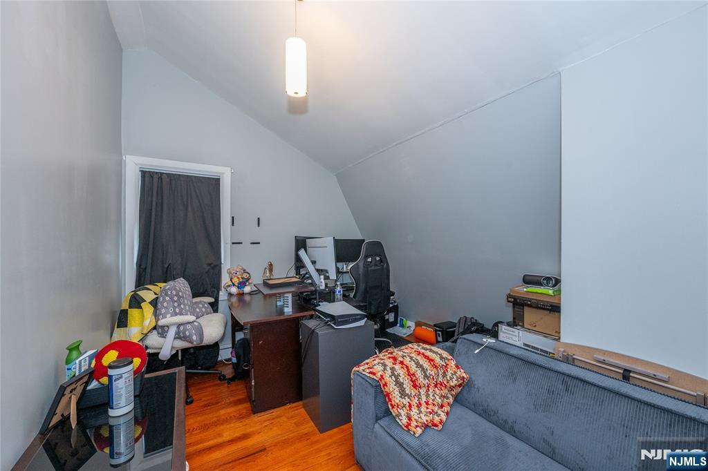 65 Grove Street Bloomfield, NJ 07003 - Photo 24 of 50 a kids room with toys and wooden floor