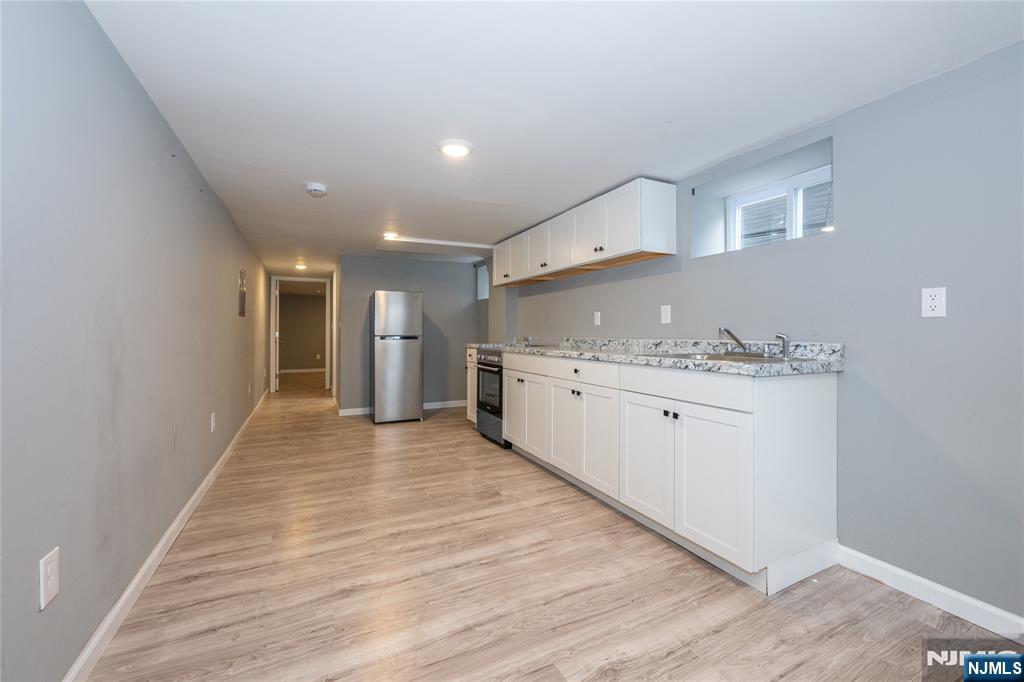 65 Grove Street Bloomfield, NJ 07003 - Photo 41 of 50 a view of a kitchen with a sink