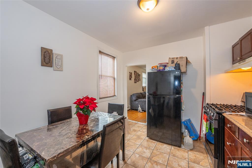 65 Grove Street Bloomfield, NJ 07003 - Photo 8 of 50 a living room with furniture and a window