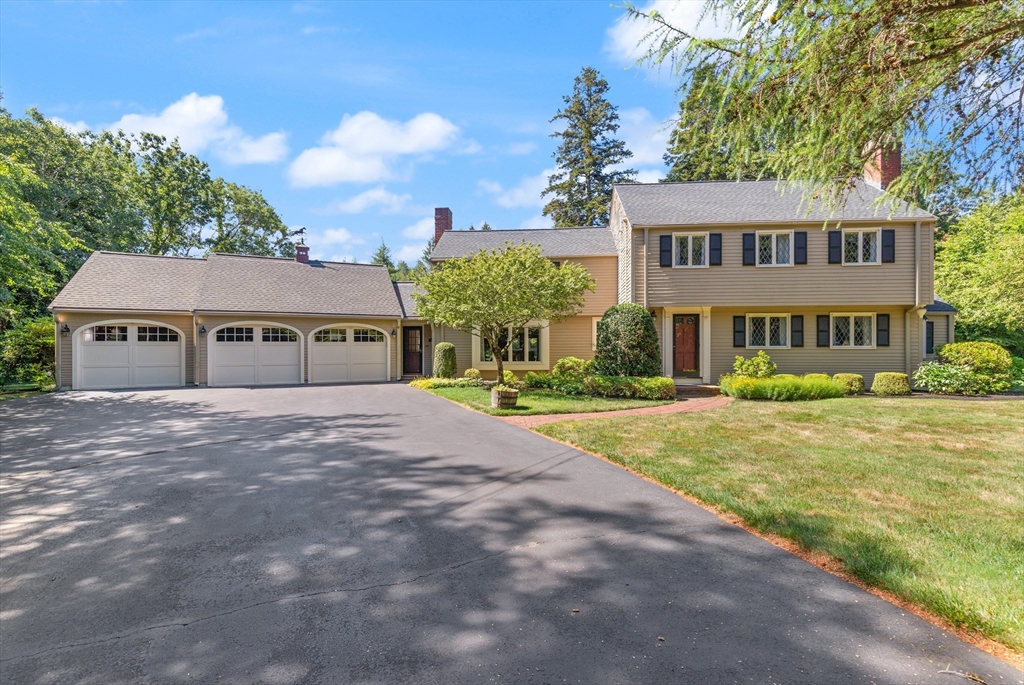 148 Ipswich Road Boxford, MA 01921 - Photo 1 of 42 a view of a house with a yard and potted plants