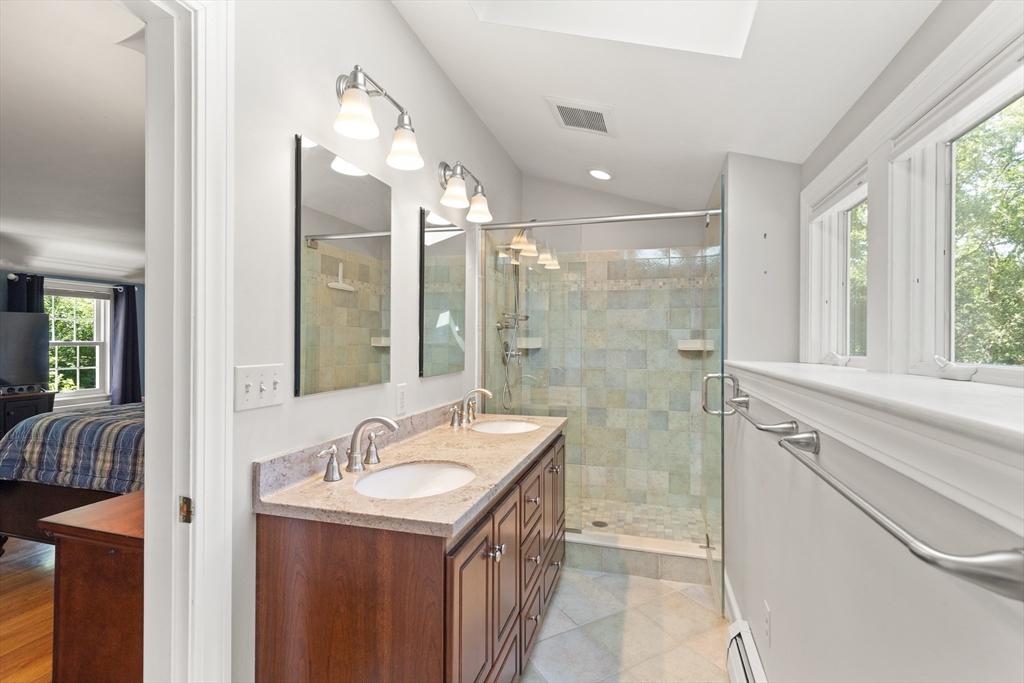 148 Ipswich Road Boxford, MA 01921 - Photo 27 of 42 a bathroom with a sink a toilet and shower