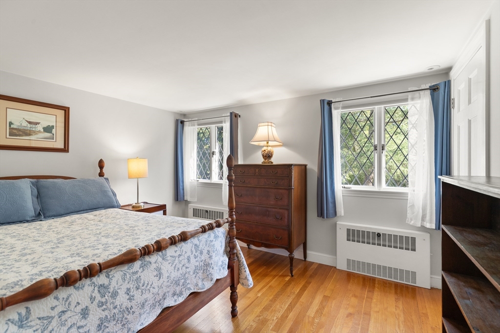 148 Ipswich Road Boxford, MA 01921 - Photo 30 of 42 a bedroom with a bed and a window