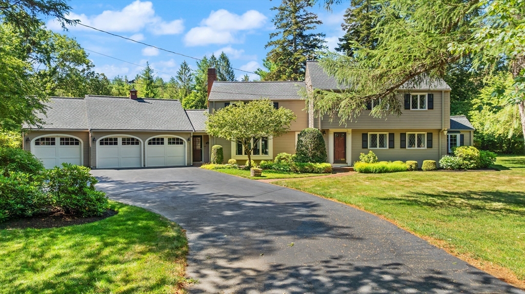 148 Ipswich Road Boxford, MA 01921 - Photo 40 of 42 a front view of a house with a yard and porch