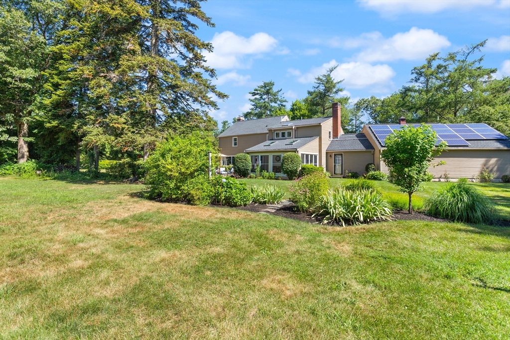 148 Ipswich Road Boxford, MA 01921 - Photo 8 of 42 a view of backyard with garden and entertaining space